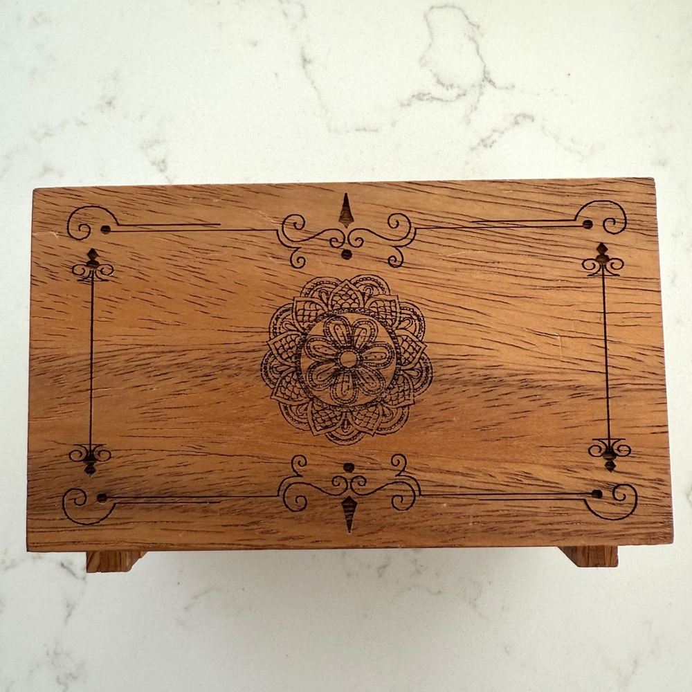 Wooden Lotus Secret Lock Box
Puzzle - Picture 2 of 5